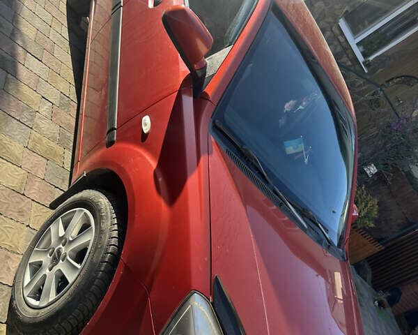 Красный Киа Рио, объемом двигателя 1.4 л и пробегом 230 тыс. км за 4300 $, фото 2 на Automoto.ua