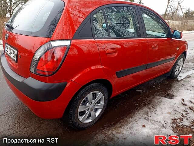 Червоний Кіа Ріо, об'ємом двигуна 1.4 л та пробігом 20200 тис. км за 3999 $, фото 9 на Automoto.ua