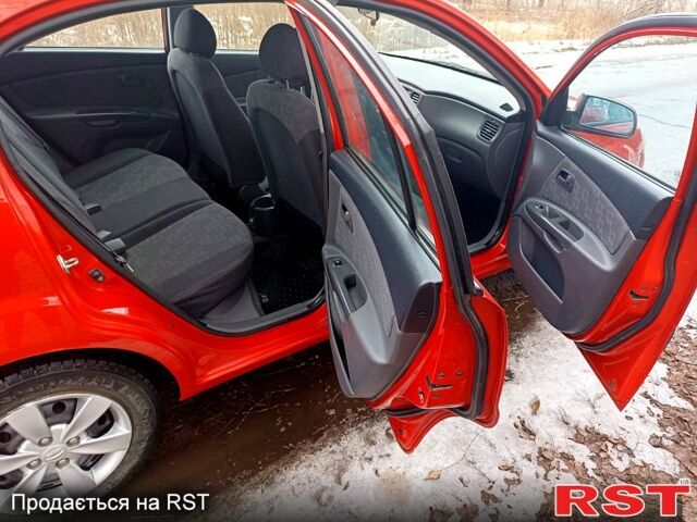 Червоний Кіа Ріо, об'ємом двигуна 1.4 л та пробігом 20200 тис. км за 3999 $, фото 5 на Automoto.ua