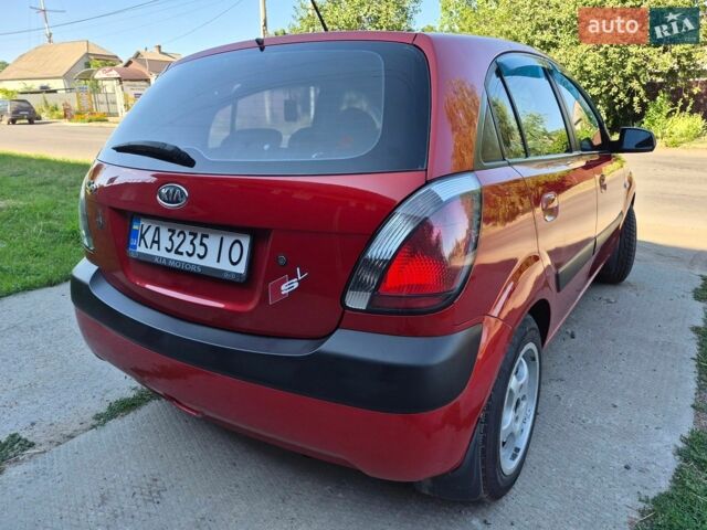 Червоний Кіа Ріо, об'ємом двигуна 1.4 л та пробігом 241 тис. км за 4400 $, фото 2 на Automoto.ua