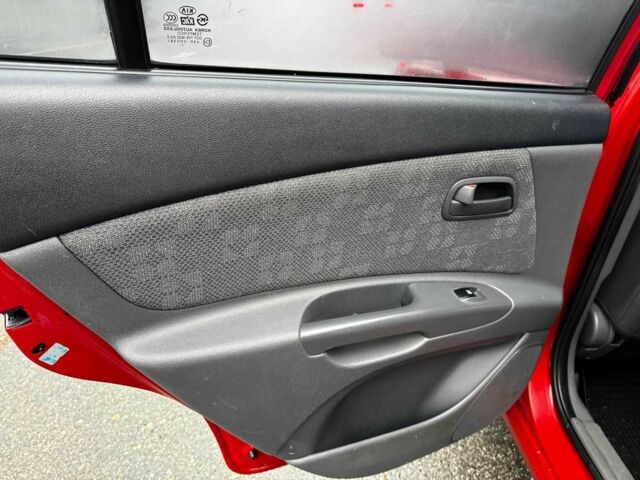 Красный Киа Рио, объемом двигателя 1.4 л и пробегом 189 тыс. км за 6490 $, фото 20 на Automoto.ua