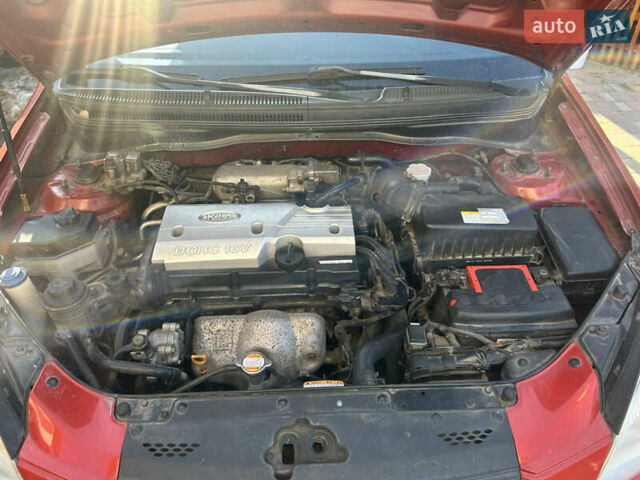 Красный Киа Рио, объемом двигателя 1.4 л и пробегом 230 тыс. км за 4300 $, фото 3 на Automoto.ua