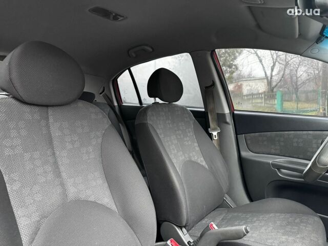 Красный Киа Рио, объемом двигателя 1.4 л и пробегом 189 тыс. км за 6490 $, фото 34 на Automoto.ua