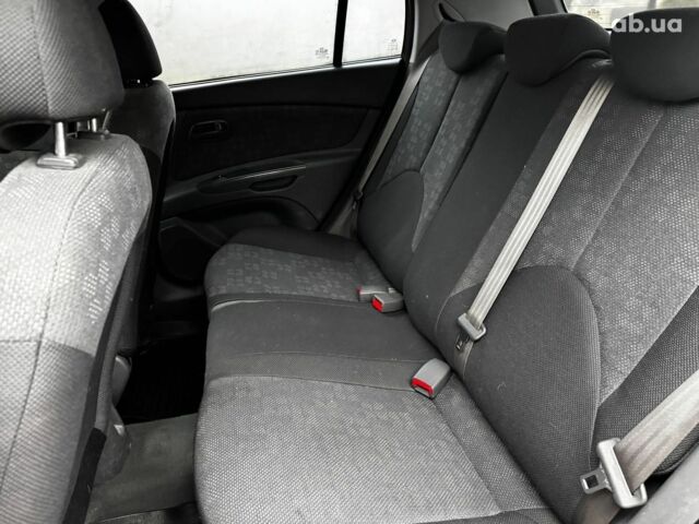 Красный Киа Рио, объемом двигателя 1.4 л и пробегом 189 тыс. км за 6490 $, фото 22 на Automoto.ua