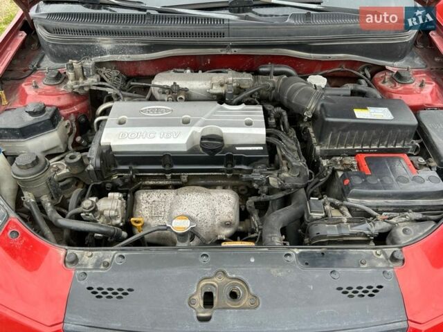 Красный Киа Рио, объемом двигателя 1.4 л и пробегом 230 тыс. км за 3900 $, фото 7 на Automoto.ua