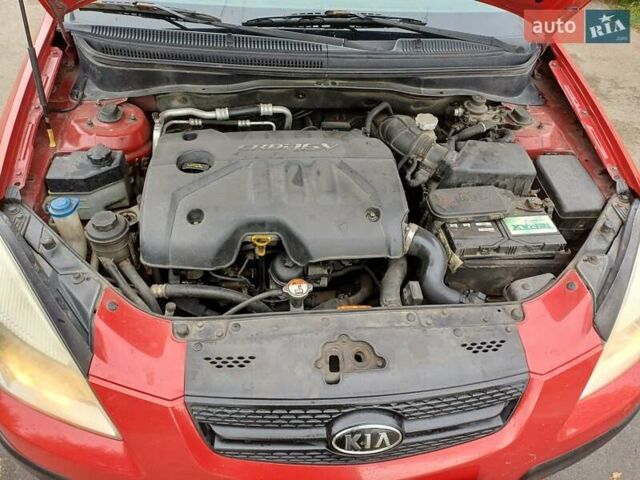 Червоний Кіа Ріо, об'ємом двигуна 1.49 л та пробігом 375 тис. км за 3450 $, фото 13 на Automoto.ua