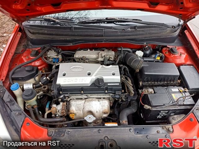 Червоний Кіа Ріо, об'ємом двигуна 1.4 л та пробігом 20200 тис. км за 3999 $, фото 3 на Automoto.ua