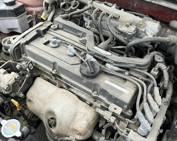 Красный Киа Рио, объемом двигателя 1.4 л и пробегом 288 тыс. км за 4700 $, фото 12 на Automoto.ua