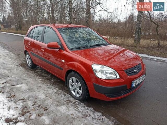 Червоний Кіа Ріо, об'ємом двигуна 1.4 л та пробігом 202 тис. км за 3999 $, фото 4 на Automoto.ua