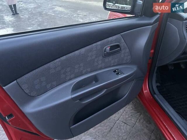 Красный Киа Рио, объемом двигателя 1.4 л и пробегом 213 тыс. км за 3800 $, фото 10 на Automoto.ua