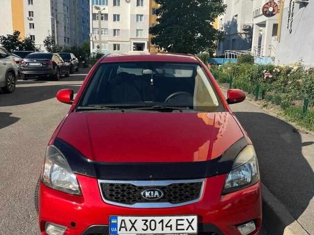 Красный Киа Рио, объемом двигателя 1.4 л и пробегом 144 тыс. км за 7200 $, фото 1 на Automoto.ua
