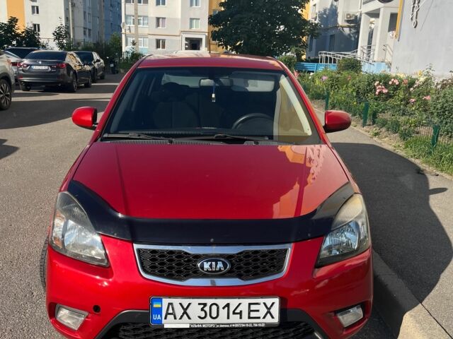 Красный Киа Рио, объемом двигателя 1.4 л и пробегом 145 тыс. км за 7020 $, фото 3 на Automoto.ua