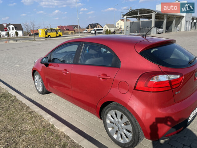 Красный Киа Рио, объемом двигателя 1.4 л и пробегом 209 тыс. км за 6000 $, фото 1 на Automoto.ua
