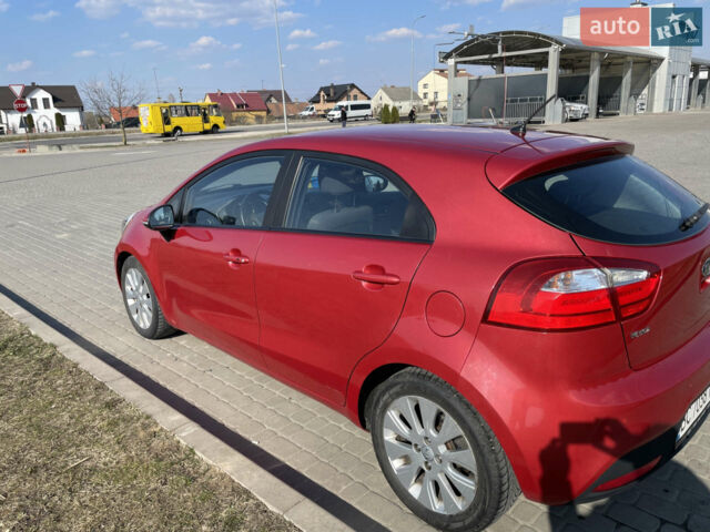 Червоний Кіа Ріо, об'ємом двигуна 1.4 л та пробігом 209 тис. км за 5800 $, фото 1 на Automoto.ua