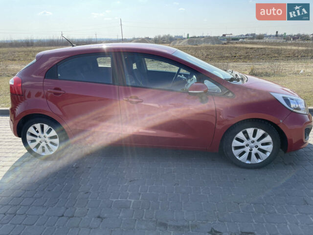 Червоний Кіа Ріо, об'ємом двигуна 1.4 л та пробігом 209 тис. км за 5800 $, фото 5 на Automoto.ua