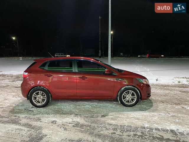 Червоний Кіа Ріо, об'ємом двигуна 1.4 л та пробігом 163 тис. км за 5600 $, фото 10 на Automoto.ua