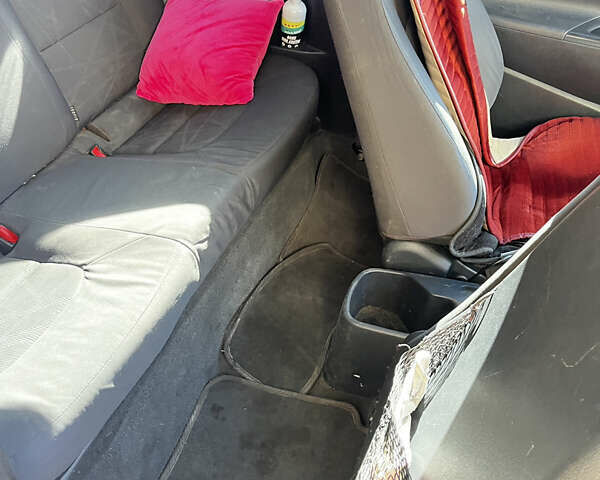 Червоний Кіа Ріо, об'ємом двигуна 1.12 л та пробігом 240 тис. км за 6000 $, фото 7 на Automoto.ua