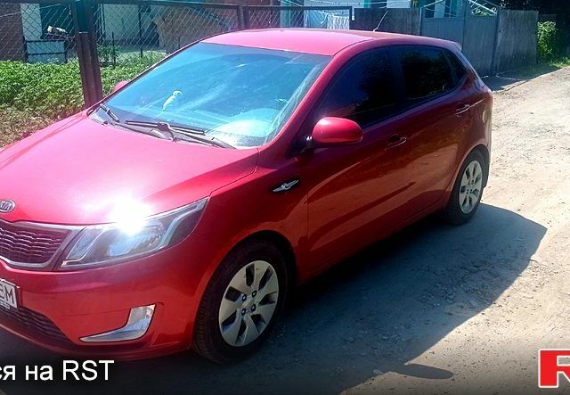 Красный Киа Рио, объемом двигателя 1.6 л и пробегом 28 тыс. км за 8200 $, фото 2 на Automoto.ua