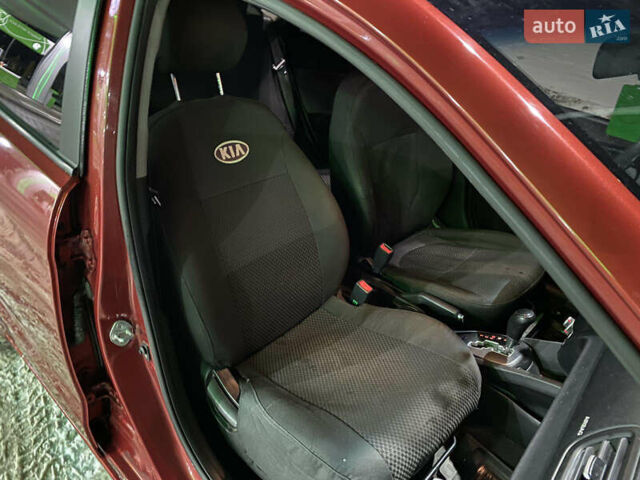 Червоний Кіа Ріо, об'ємом двигуна 1.4 л та пробігом 163 тис. км за 5600 $, фото 16 на Automoto.ua