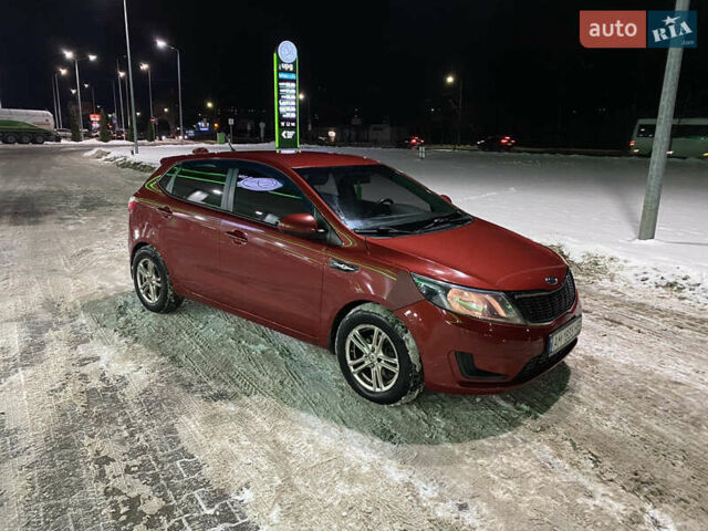 Червоний Кіа Ріо, об'ємом двигуна 1.4 л та пробігом 163 тис. км за 5600 $, фото 2 на Automoto.ua