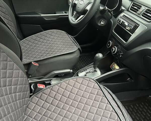Красный Киа Рио, объемом двигателя 1.4 л и пробегом 181 тыс. км за 6800 $, фото 6 на Automoto.ua