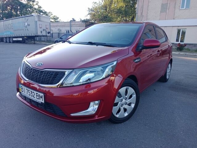 Червоний Кіа Ріо, об'ємом двигуна 1.6 л та пробігом 28 тис. км за 10350 $, фото 9 на Automoto.ua