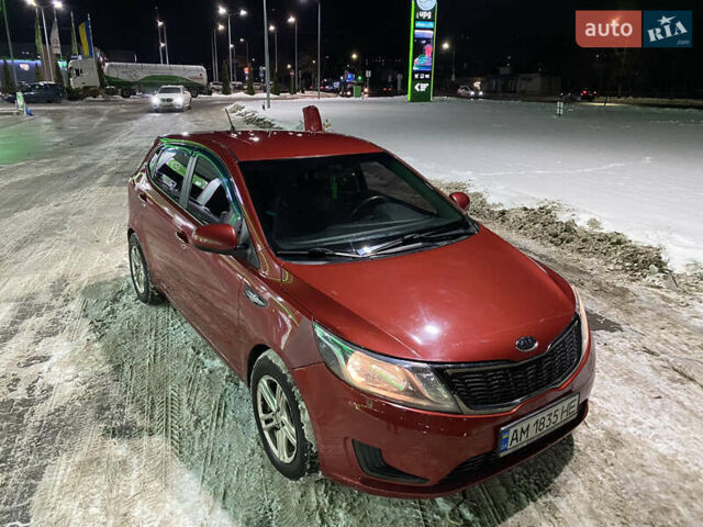 Червоний Кіа Ріо, об'ємом двигуна 1.4 л та пробігом 163 тис. км за 5600 $, фото 1 на Automoto.ua