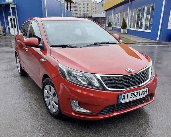 Красный Киа Рио, объемом двигателя 1.4 л и пробегом 181 тыс. км за 6800 $, фото 2 на Automoto.ua