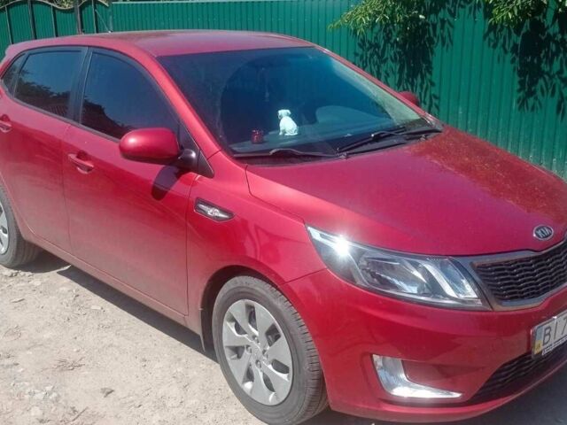 Червоний Кіа Ріо, об'ємом двигуна 1.6 л та пробігом 28 тис. км за 8159 $, фото 2 на Automoto.ua