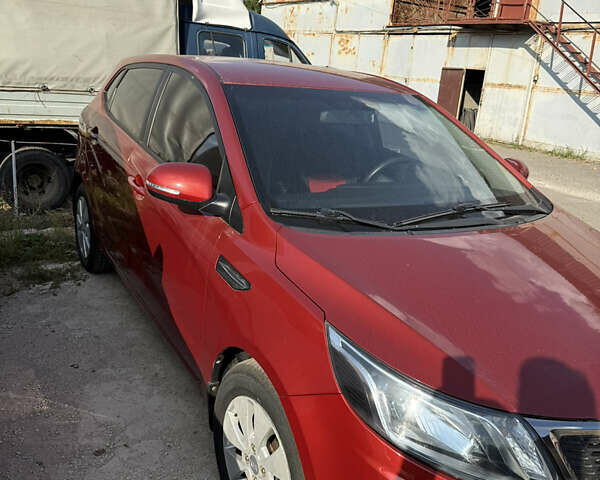 Красный Киа Рио, объемом двигателя 1.59 л и пробегом 48 тыс. км за 10000 $, фото 1 на Automoto.ua