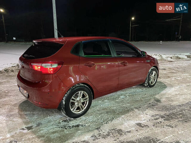 Червоний Кіа Ріо, об'ємом двигуна 1.4 л та пробігом 163 тис. км за 5600 $, фото 9 на Automoto.ua