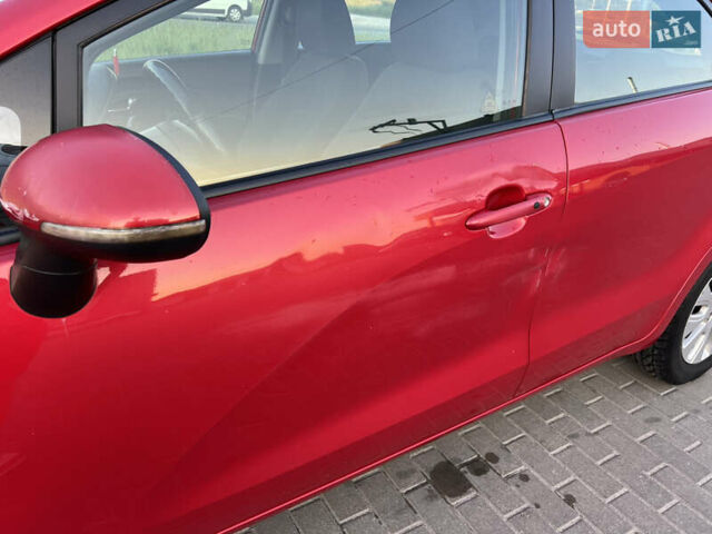 Красный Киа Рио, объемом двигателя 1.1 л и пробегом 203 тыс. км за 6200 $, фото 5 на Automoto.ua