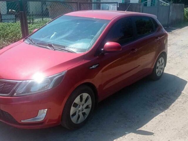 Червоний Кіа Ріо, об'ємом двигуна 1.6 л та пробігом 28 тис. км за 8159 $, фото 1 на Automoto.ua