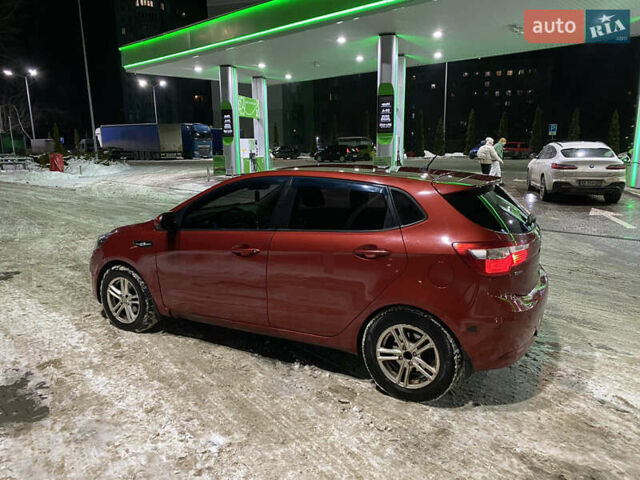 Червоний Кіа Ріо, об'ємом двигуна 1.4 л та пробігом 163 тис. км за 5600 $, фото 6 на Automoto.ua