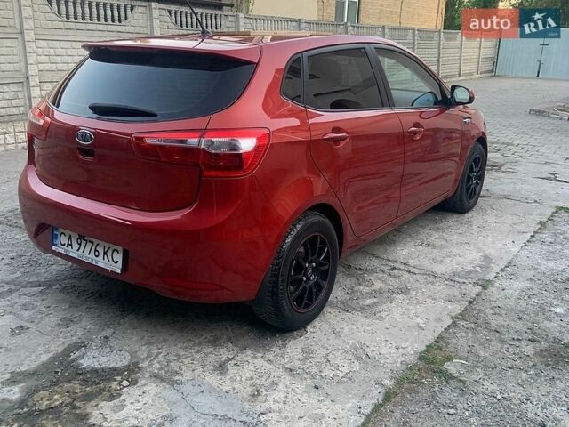 Красный Киа Рио, объемом двигателя 1.4 л и пробегом 123 тыс. км за 8300 $, фото 1 на Automoto.ua