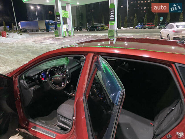 Червоний Кіа Ріо, об'ємом двигуна 1.4 л та пробігом 163 тис. км за 5600 $, фото 12 на Automoto.ua