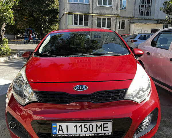 Красный Киа Рио, объемом двигателя 1.12 л и пробегом 240 тыс. км за 5000 $, фото 5 на Automoto.ua
