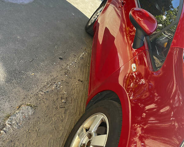 Червоний Кіа Ріо, об'ємом двигуна 1.12 л та пробігом 240 тис. км за 6000 $, фото 5 на Automoto.ua