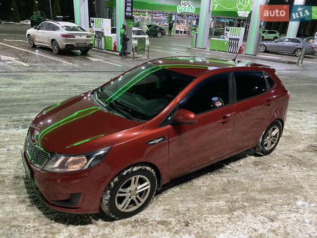 Червоний Кіа Ріо, об'ємом двигуна 1.4 л та пробігом 163 тис. км за 5600 $, фото 11 на Automoto.ua