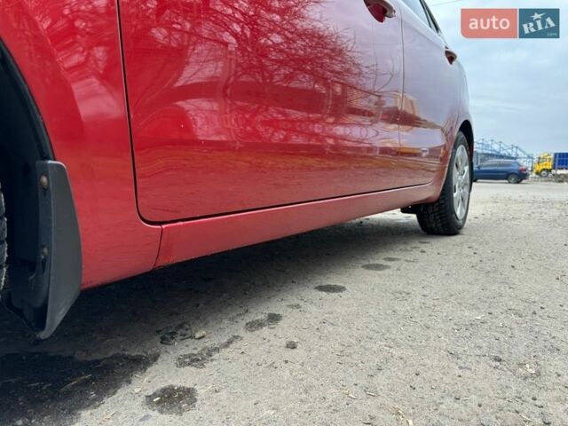 Червоний Кіа Ріо, об'ємом двигуна 1.59 л та пробігом 137 тис. км за 7500 $, фото 5 на Automoto.ua