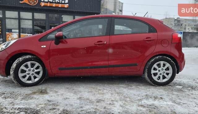 Красный Киа Рио, объемом двигателя 1.12 л и пробегом 97 тыс. км за 6700 $, фото 1 на Automoto.ua