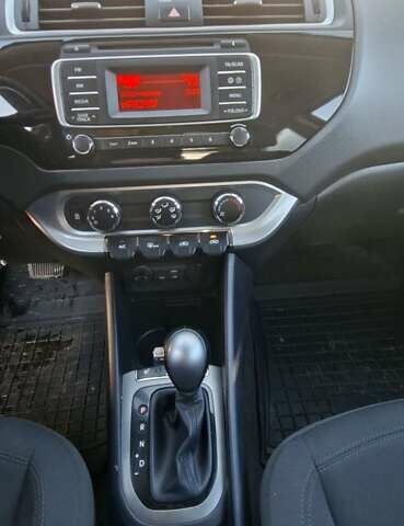 Червоний Кіа Ріо, об'ємом двигуна 1.4 л та пробігом 104 тис. км за 9500 $, фото 12 на Automoto.ua