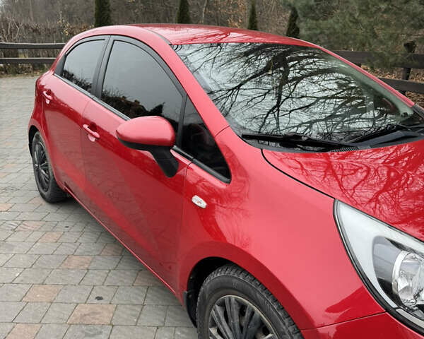 Красный Киа Рио, объемом двигателя 1.4 л и пробегом 100 тыс. км за 7700 $, фото 8 на Automoto.ua