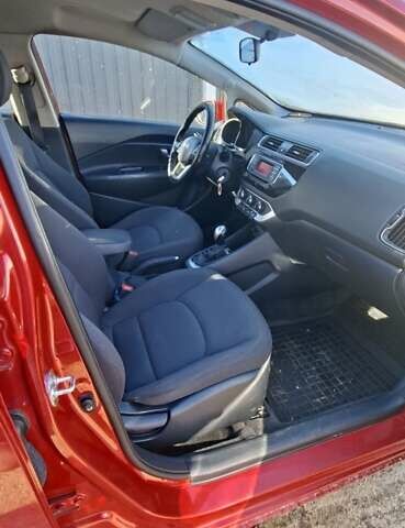 Червоний Кіа Ріо, об'ємом двигуна 1.4 л та пробігом 104 тис. км за 9500 $, фото 7 на Automoto.ua