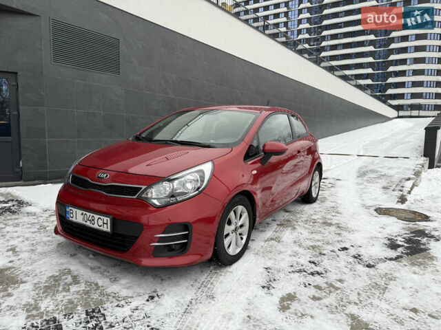 Червоний Кіа Ріо, об'ємом двигуна 1.4 л та пробігом 77 тис. км за 9900 $, фото 6 на Automoto.ua
