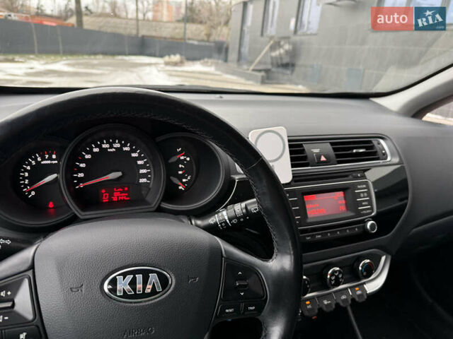 Червоний Кіа Ріо, об'ємом двигуна 1.4 л та пробігом 77 тис. км за 9900 $, фото 10 на Automoto.ua