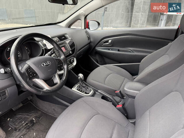 Червоний Кіа Ріо, об'ємом двигуна 1.4 л та пробігом 77 тис. км за 9900 $, фото 12 на Automoto.ua
