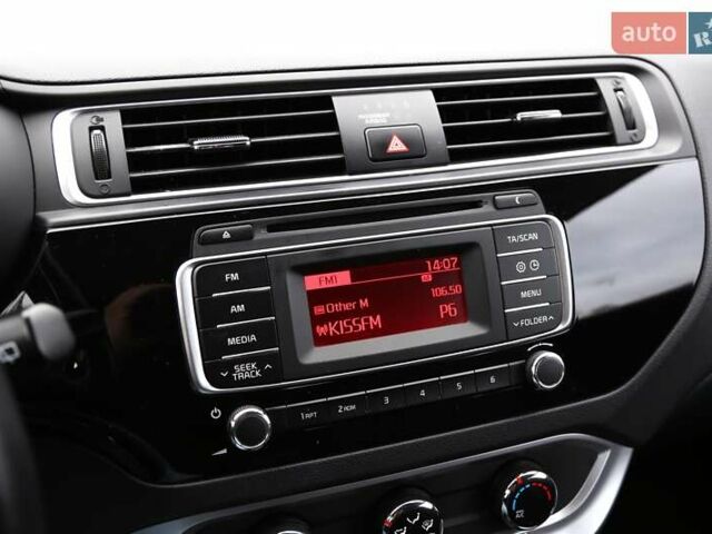 Красный Киа Рио, объемом двигателя 1.4 л и пробегом 77 тыс. км за 12000 $, фото 13 на Automoto.ua