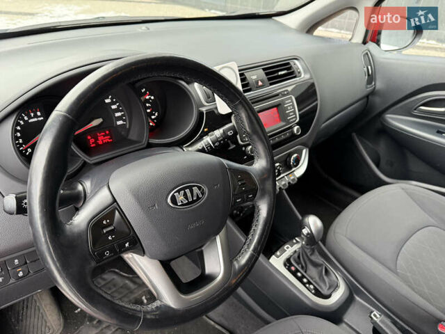 Червоний Кіа Ріо, об'ємом двигуна 1.4 л та пробігом 77 тис. км за 9900 $, фото 13 на Automoto.ua