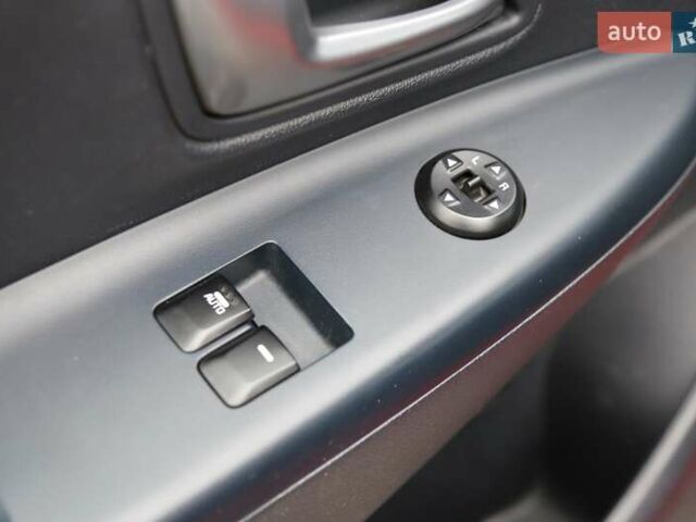 Красный Киа Рио, объемом двигателя 1.4 л и пробегом 77 тыс. км за 12000 $, фото 16 на Automoto.ua